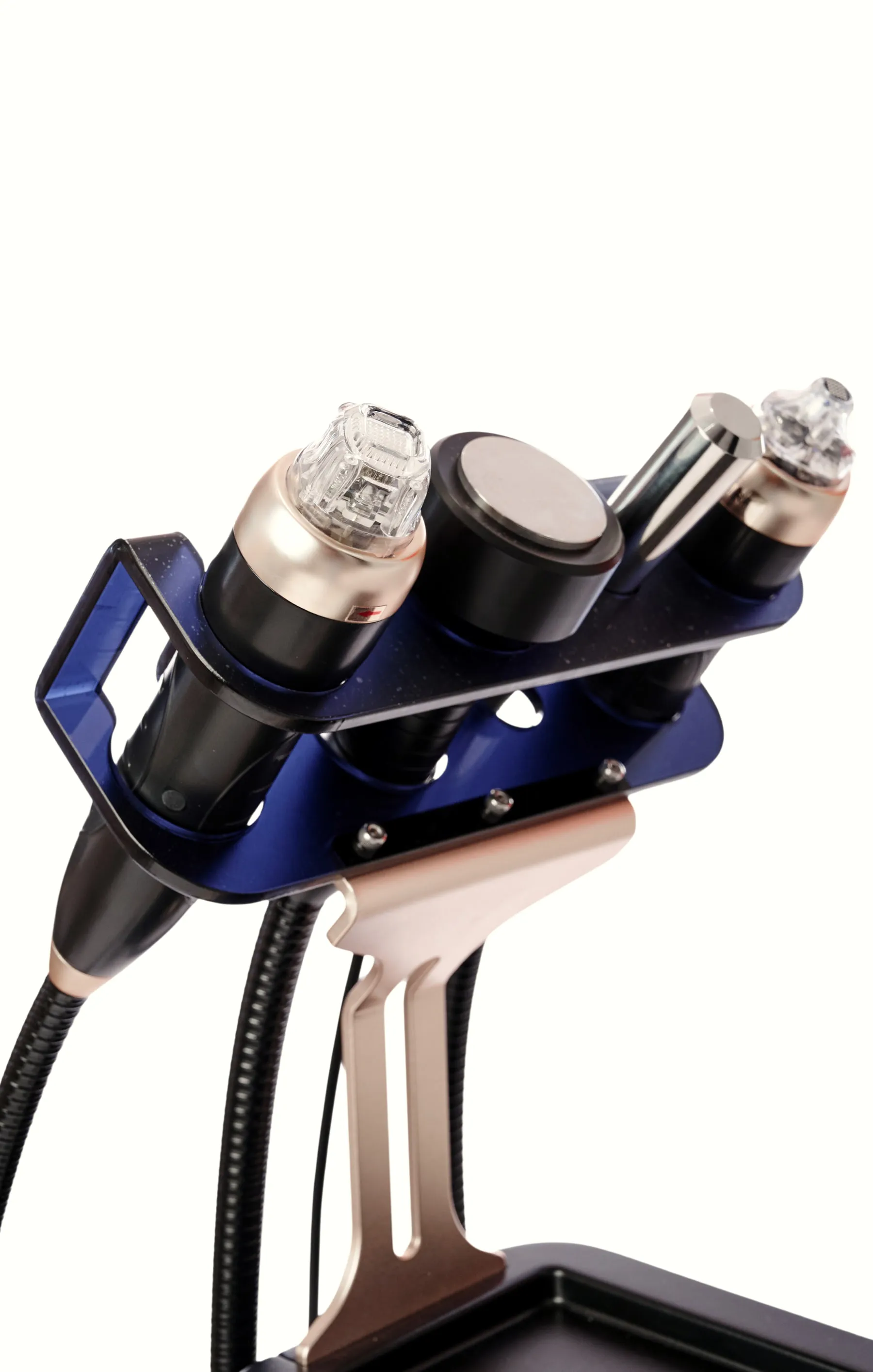 SALANO Optimus handpieces in their holder